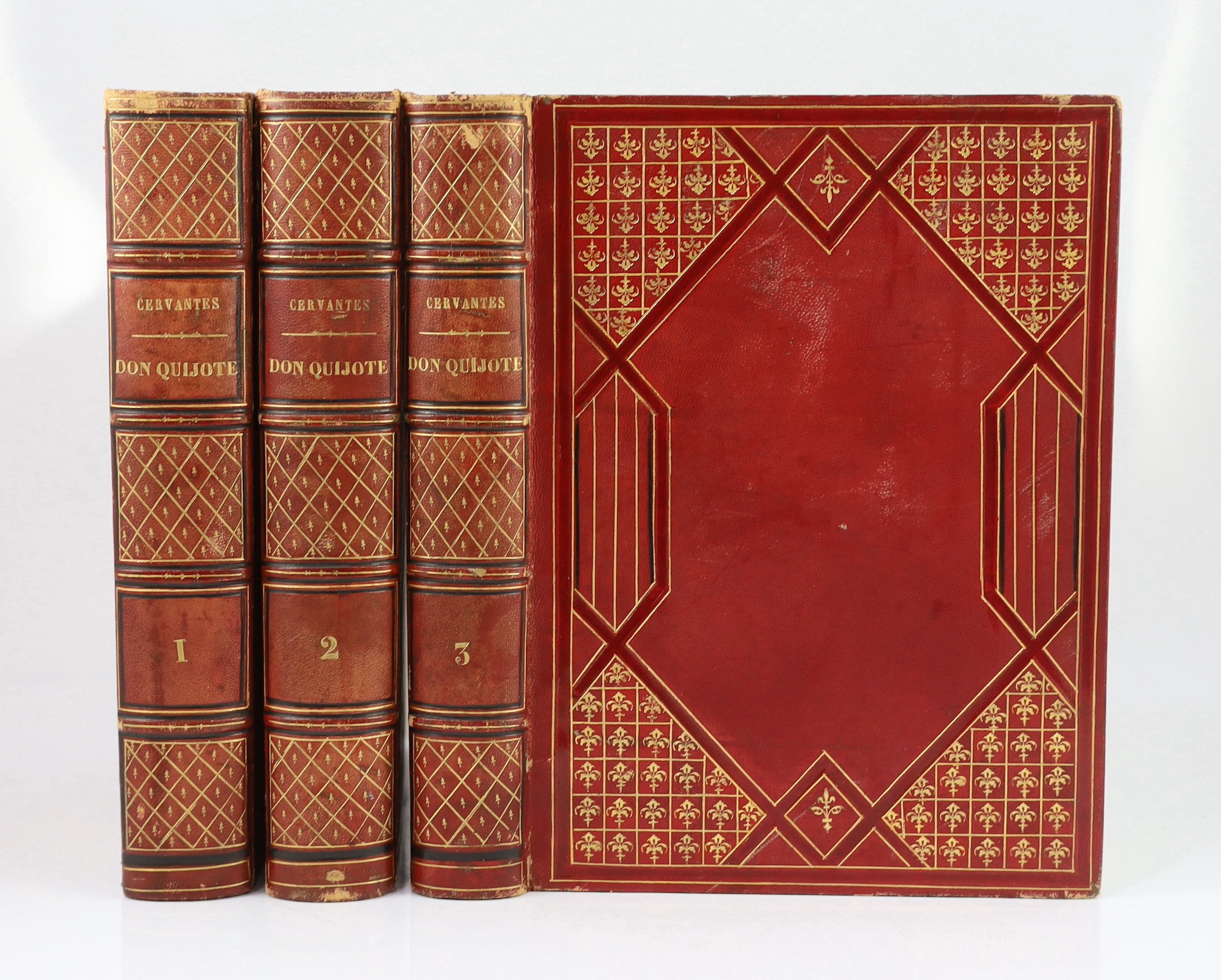 Cervantes Saavedra, Miguel de - Don Quixote de La Mancha, 3 vols, 4to, red morocco gilt, extremities rubbed, watered silk covered end-papers, 41 engraved copper plates from the 1780 edition. En La Imprenta Nacional, Madr